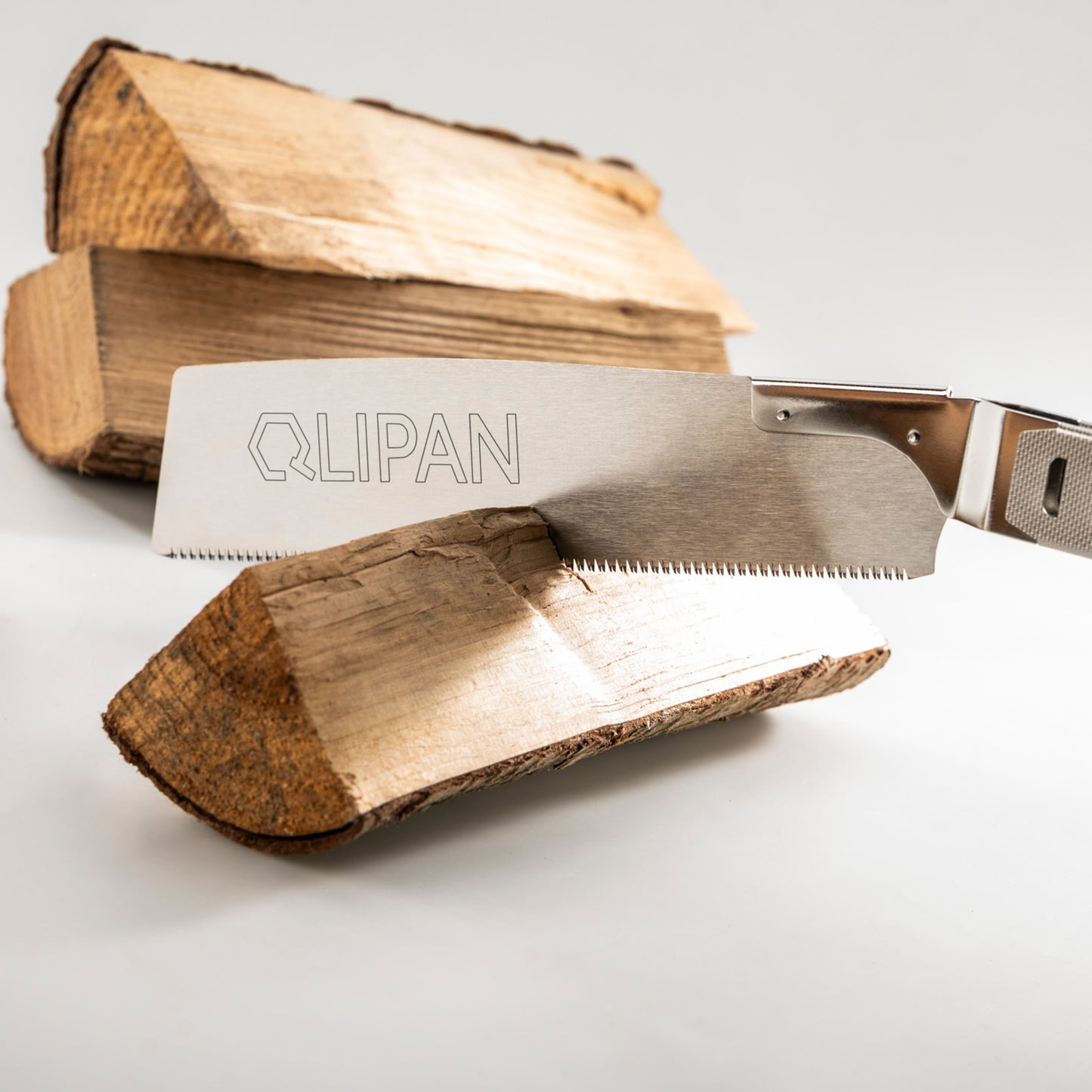 QLIPAN Säge Qlip beim Sägen von Holz