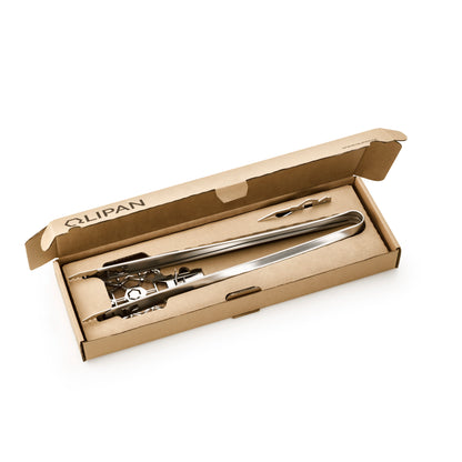 Geöffnete Verpackung des QLIPAN Starter Sets mit Inhalt